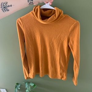 Soft orange turtleneck sweater!
